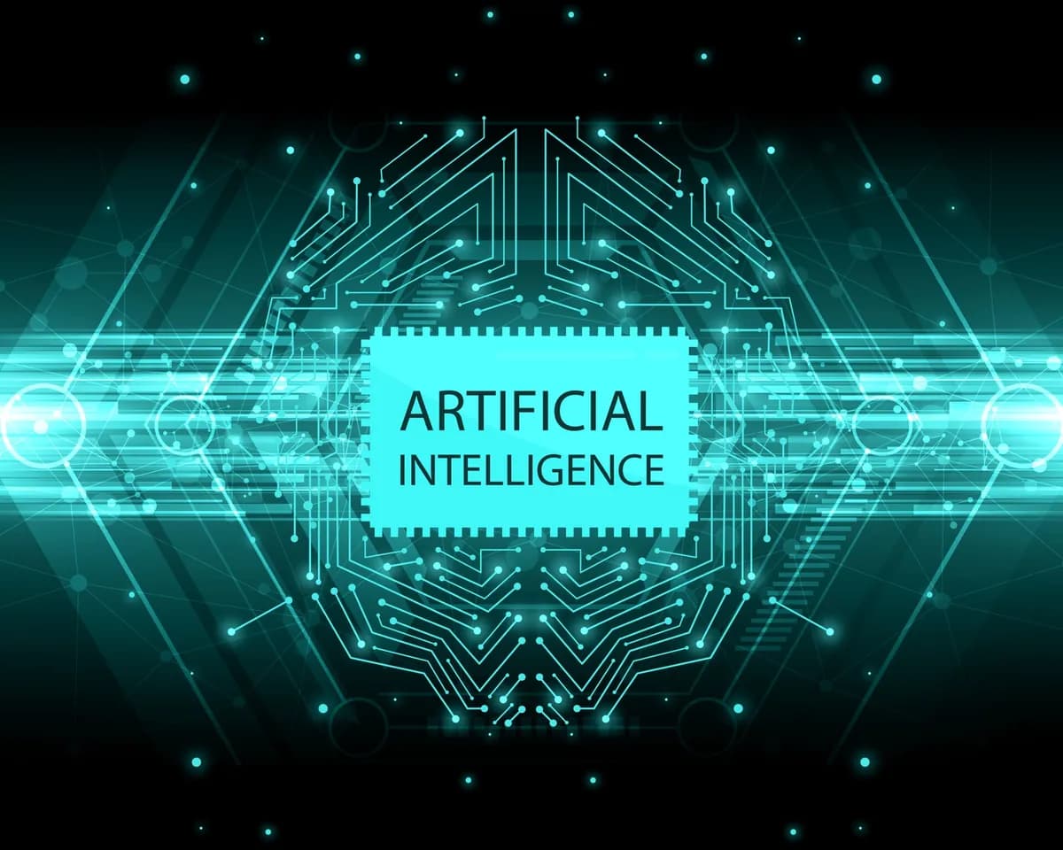 Teal illustration of a circuit-board brain with the words Artificial Intelligence